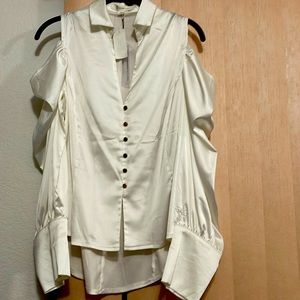 Long sleeve cold off shoulder blouse with puffed sleeve.